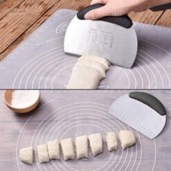 Baker's blade is being used to cut the dough